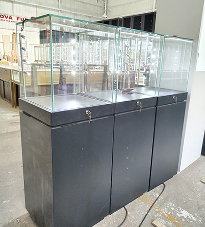 Black jewelry pedestal cases and showcases finished